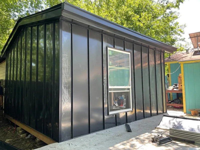 Black standing seam metal wall panels for Metal Roof Installation in Kula